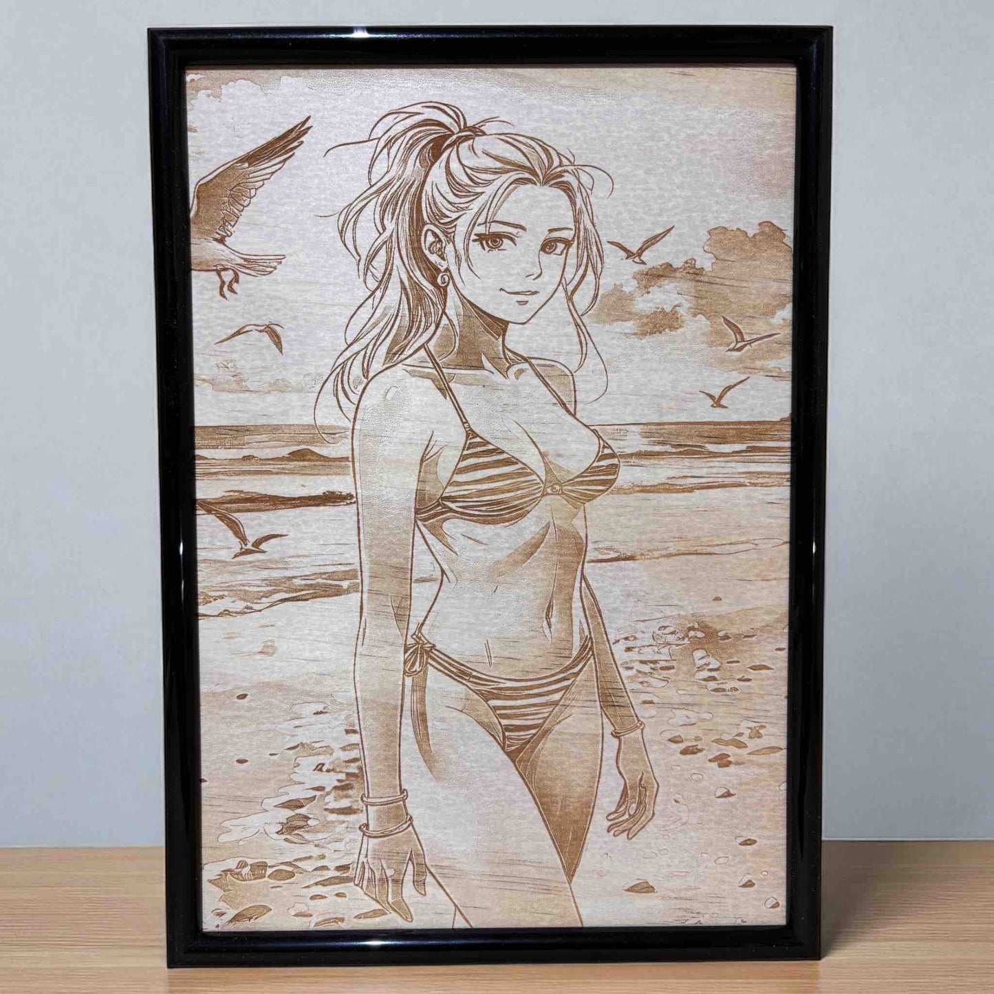 Coastal-themed wood engraved decor with a beach girl design, Laser Design Creations.