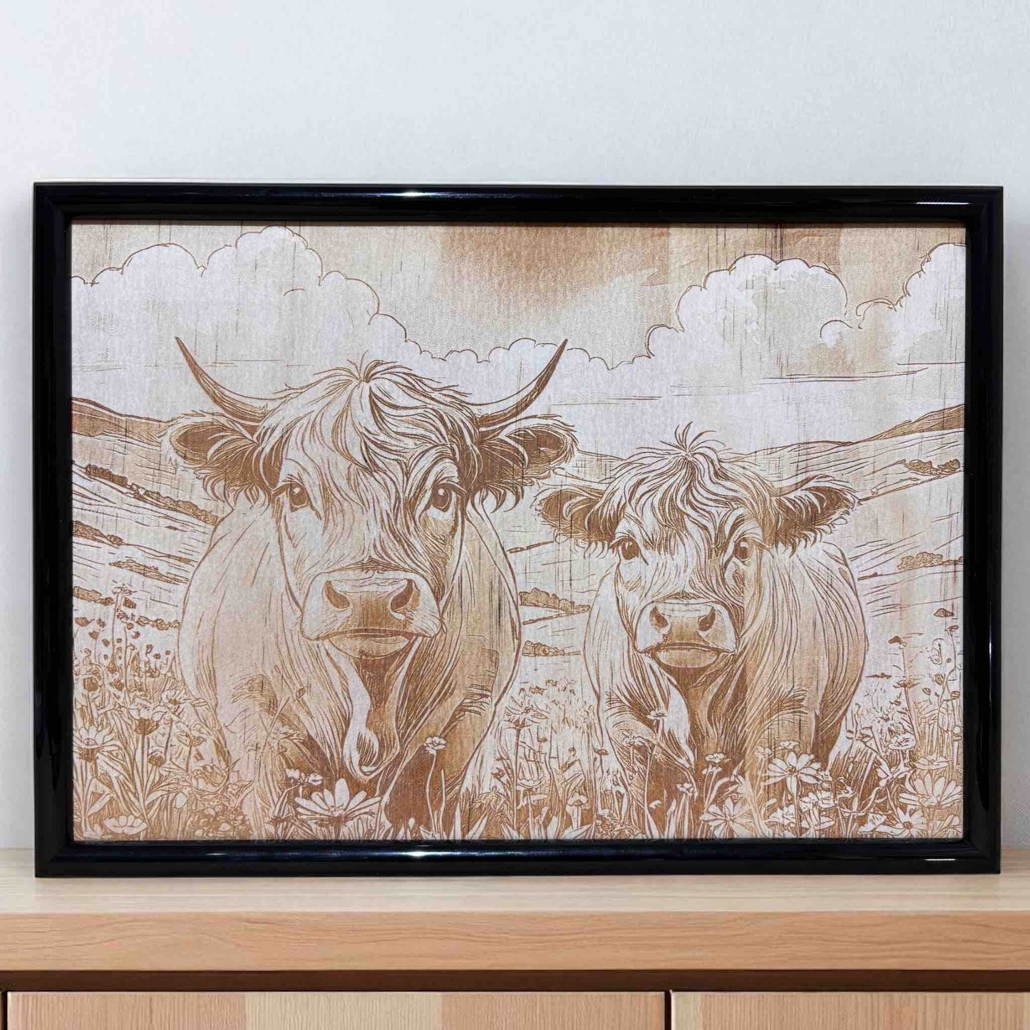 Lifestyle photo of Highland cows duo wood engraved art by Laser Design Creations.