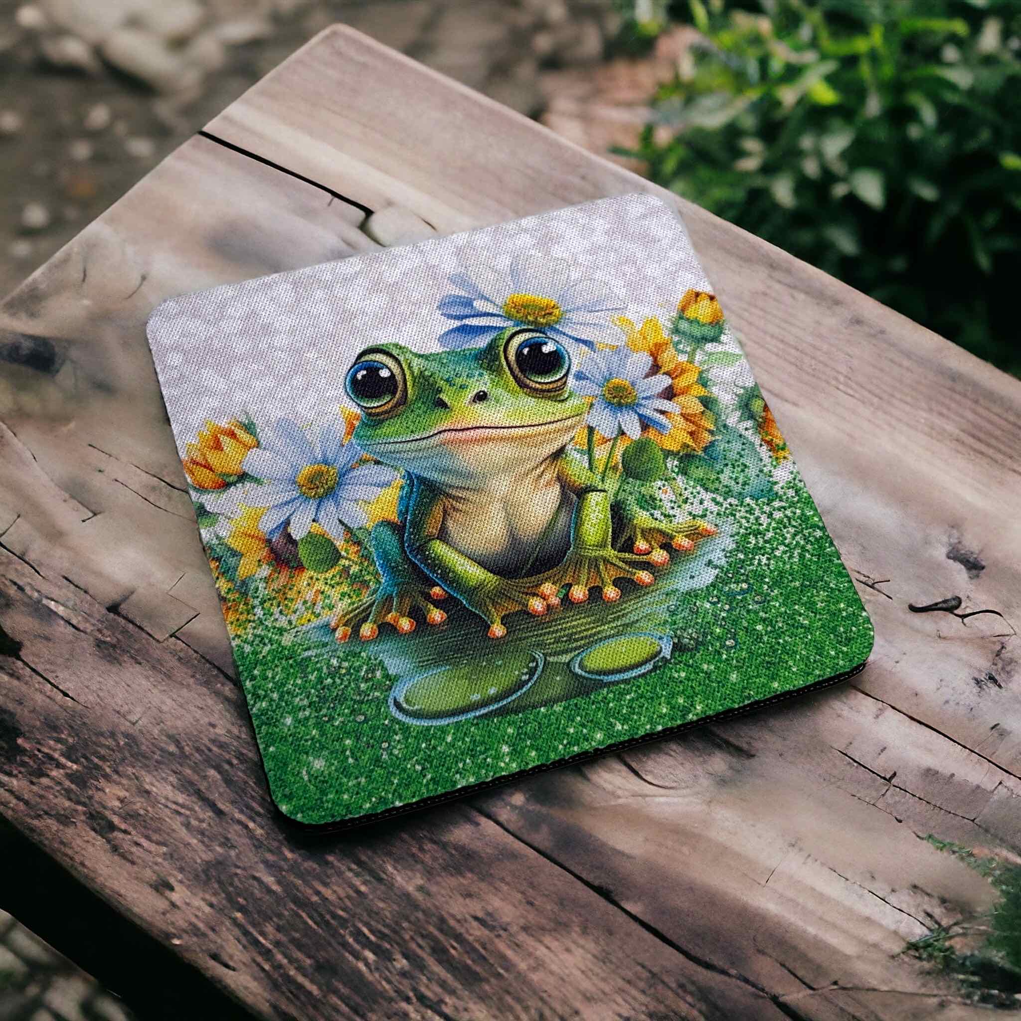 Reverse side of charming frog neoprene coasters, showcasing a cute green frog in a pond with flowers by Laser Design Creations.