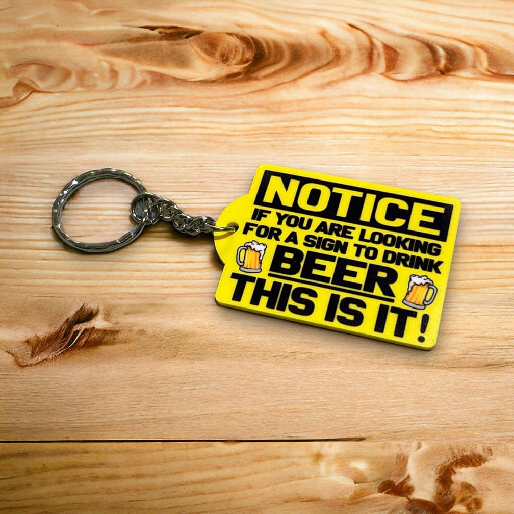 Side view of the Your Sign To Drink Beer acrylic keyring, showcasing the bold humorous notice asking if you need a sign to drink beer by Laser Design Creations.