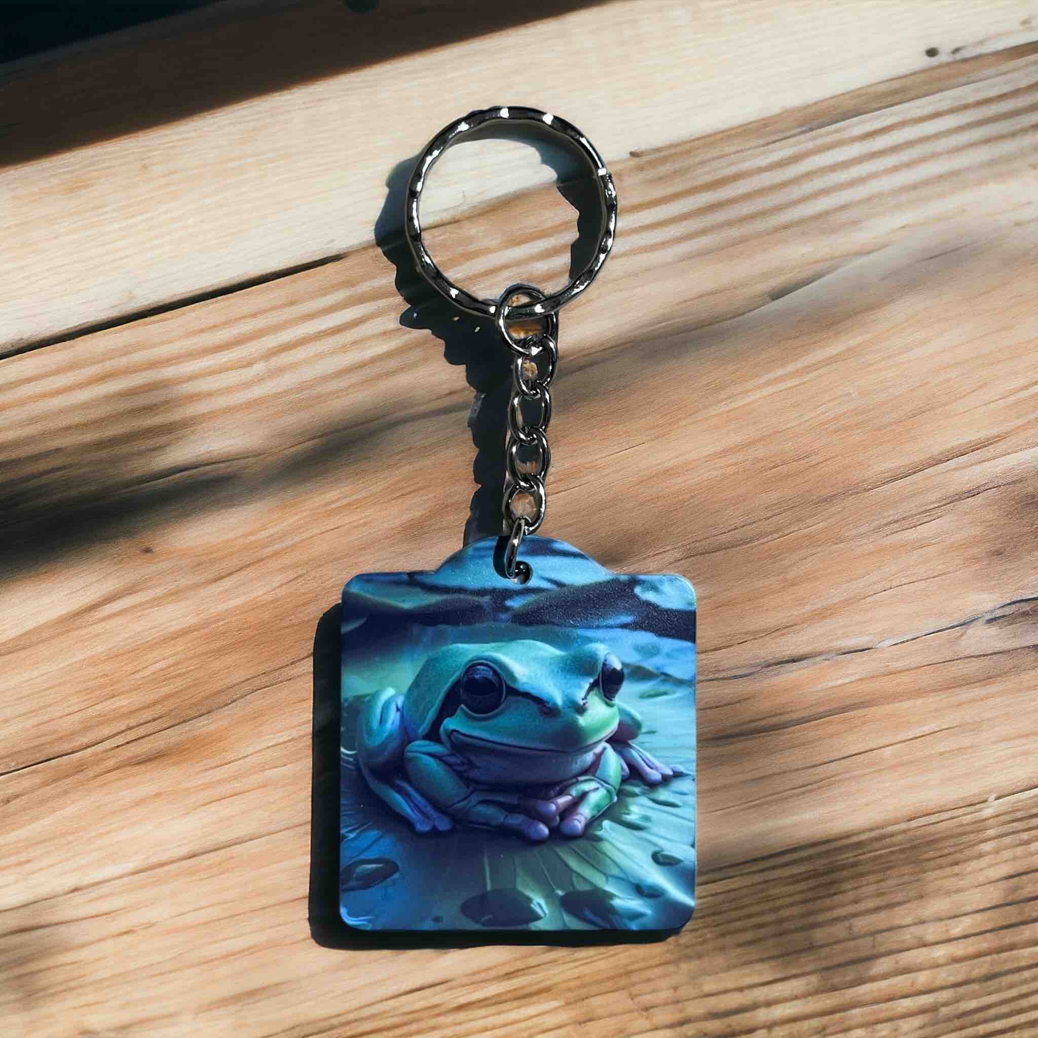 Green Tree Frog on Lily Pad keyring by Laser Design Creations, featuring a realistic frog in a nature setting.