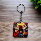 A Vibrant Mosaic Bee Floral keyring by Laser Design Creations, featuring a stunning bee within a vibrant, intricate floral mosaic, featuring a stained-glass effect.