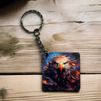 A Fiery Eagle Collection keyring, showcasing a close-up, intense and fiery artistic rendering of an eagle's eye by Laser Design Creations.