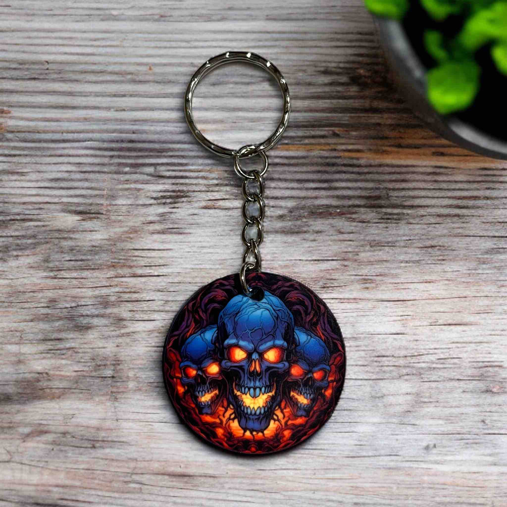 Macabre Skull keyring, showcasing the forth of five gothic skull designs with glowing eyes by Laser Design Creations.