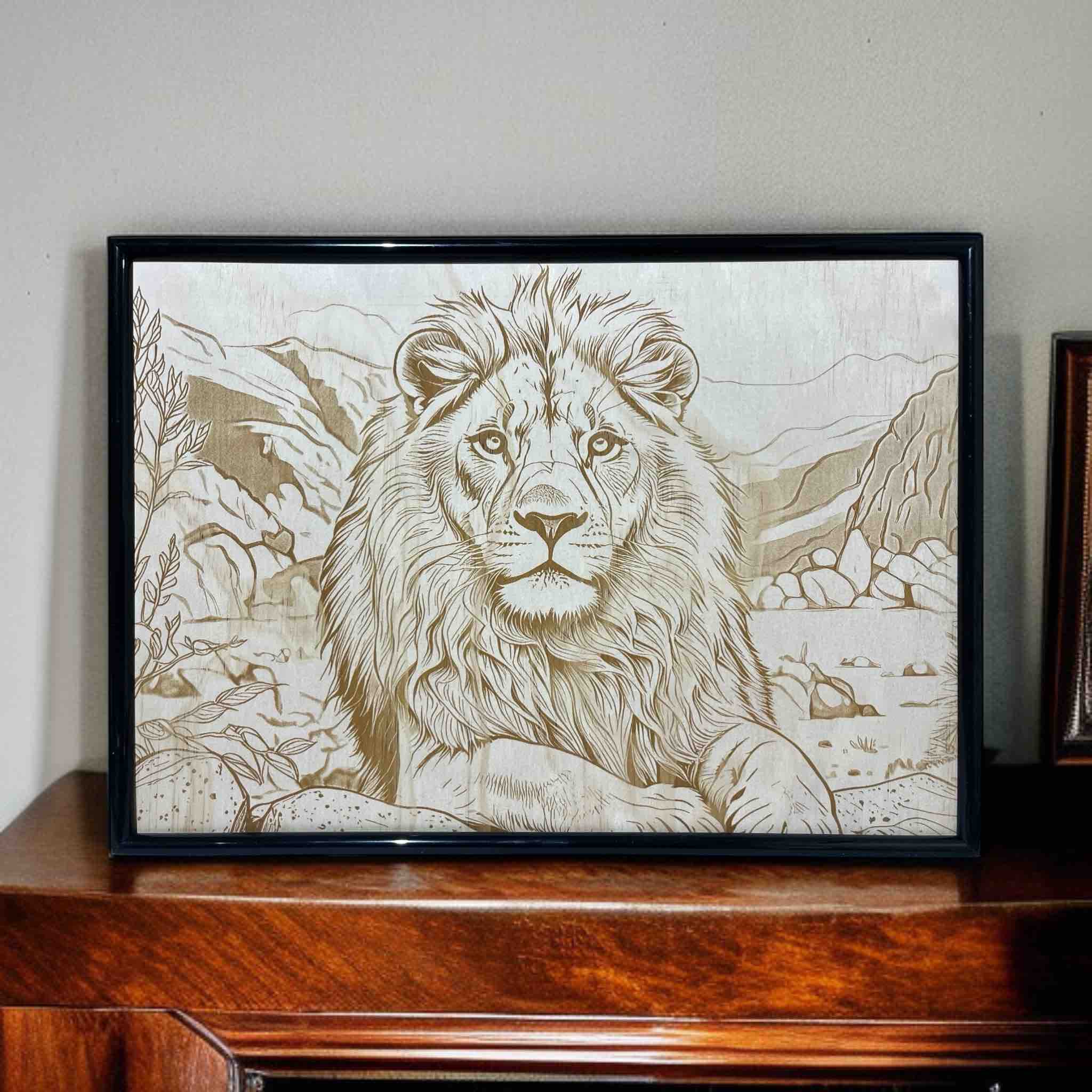 Framed artwork of a lion with a mountainous landscape in the background