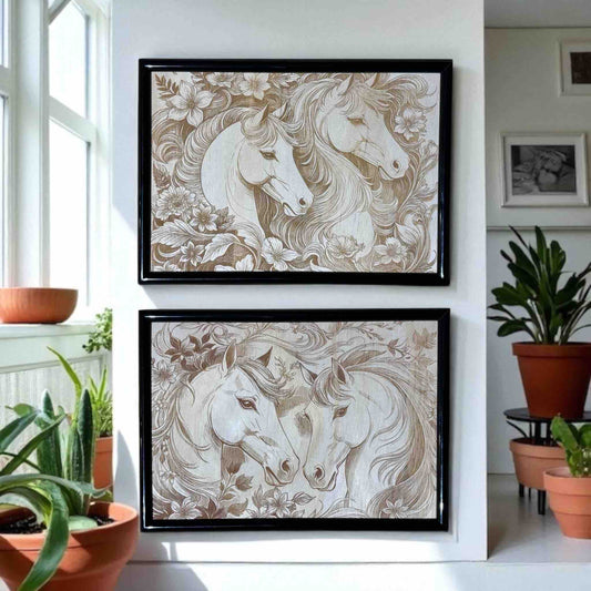 Two framed artworks of horses on a wall with plants around