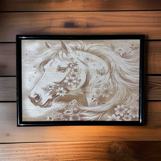 Framed artwork of a horse with floral patterns on a wooden wall.