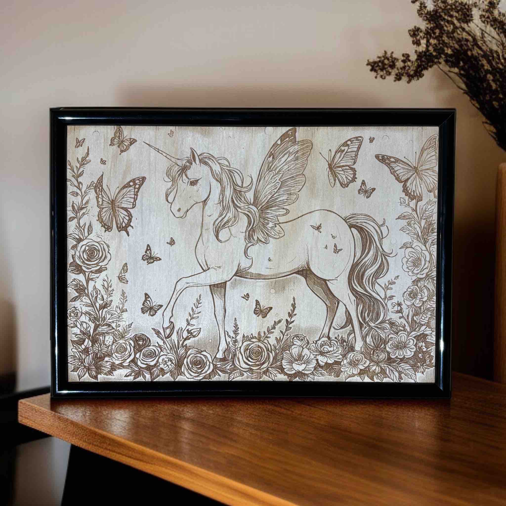 Unicorn with butterfly wings wood engraved sign displayed on timber shelf, whimsical kids’ wall art, Laser Design Creations, Australia.