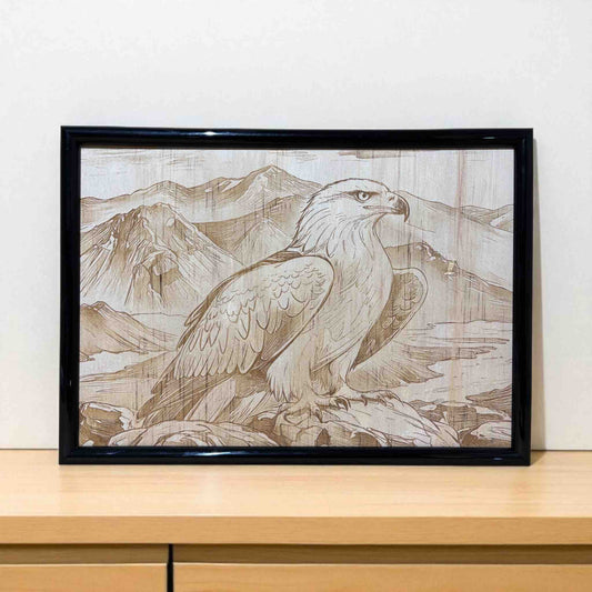 Framed artwork of an eagle with mountain landscape