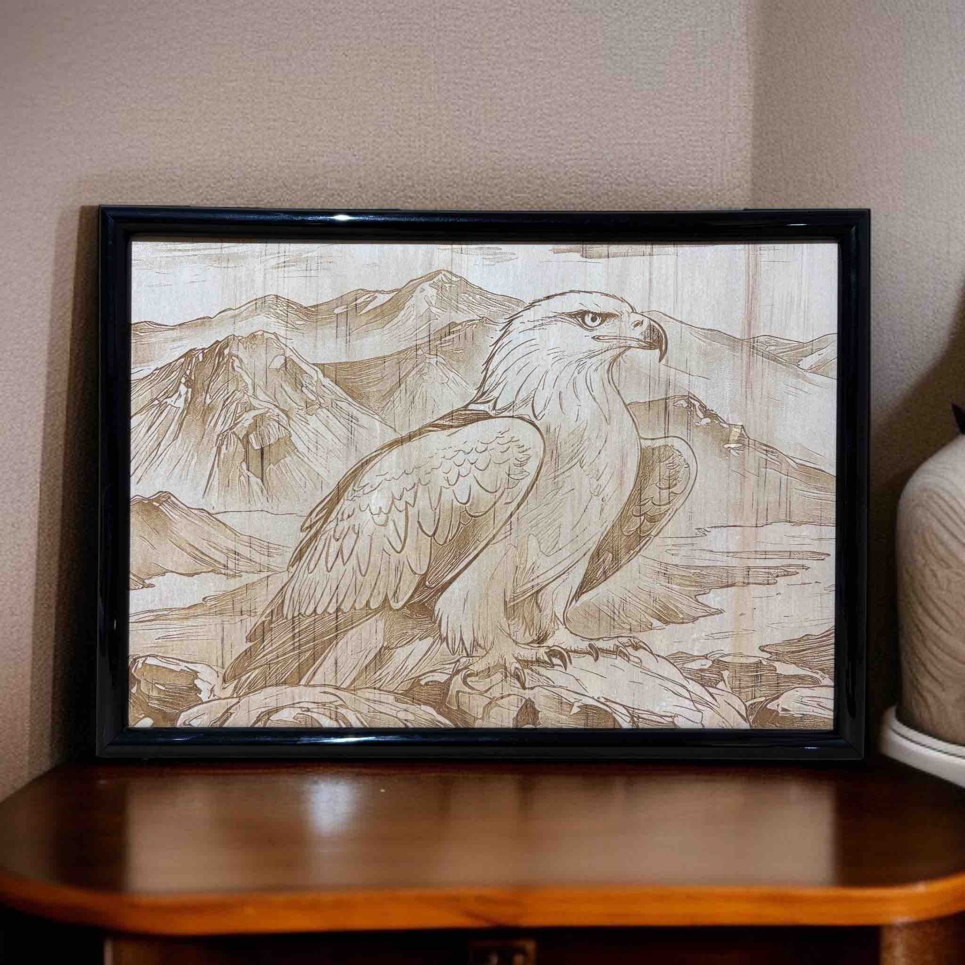 Framed artwork of an eagle with mountain landscape