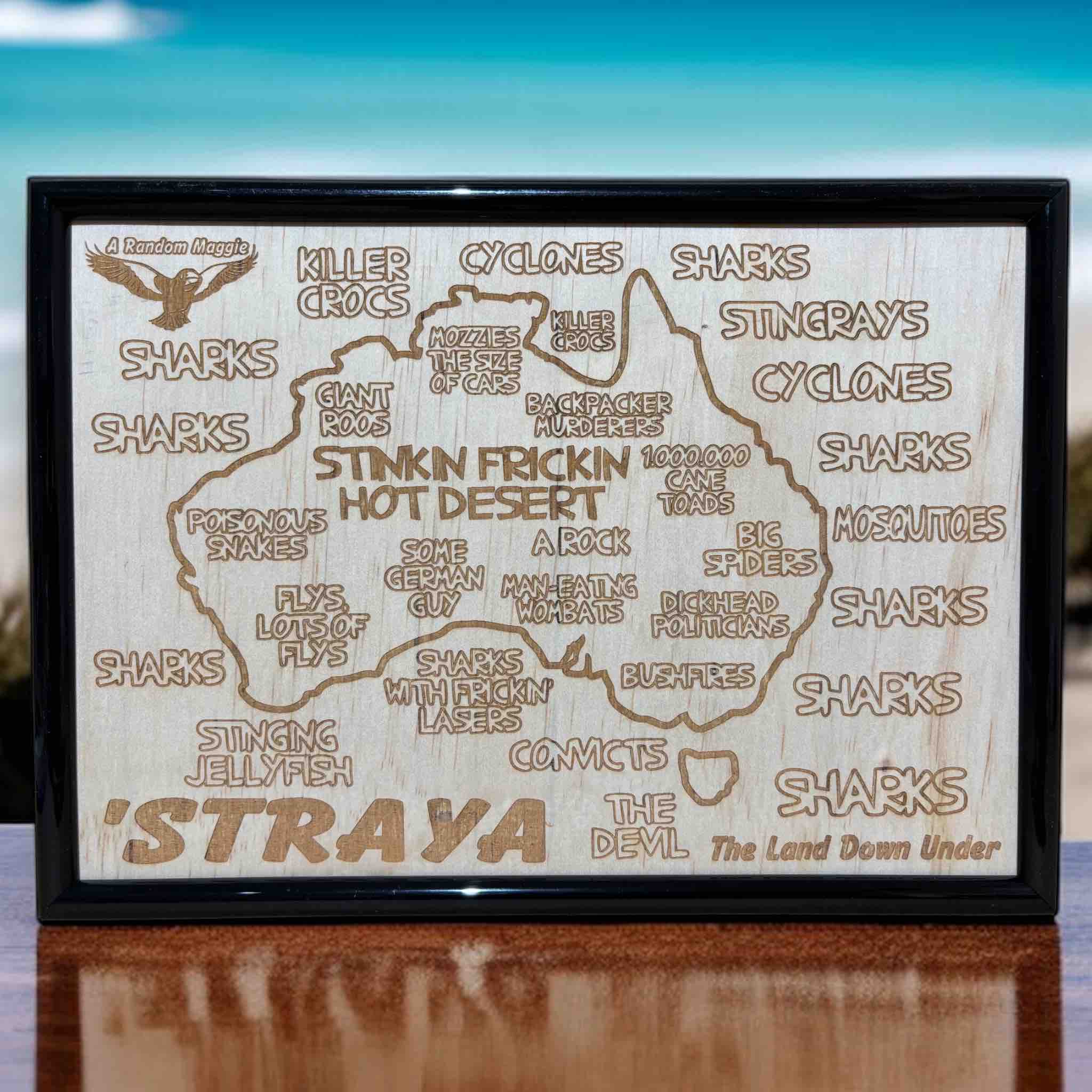 Australia map wood engraved sign displayed on wooden table with scenic background, humorous, funny Aussie gift, Laser Design Creations, Australia.