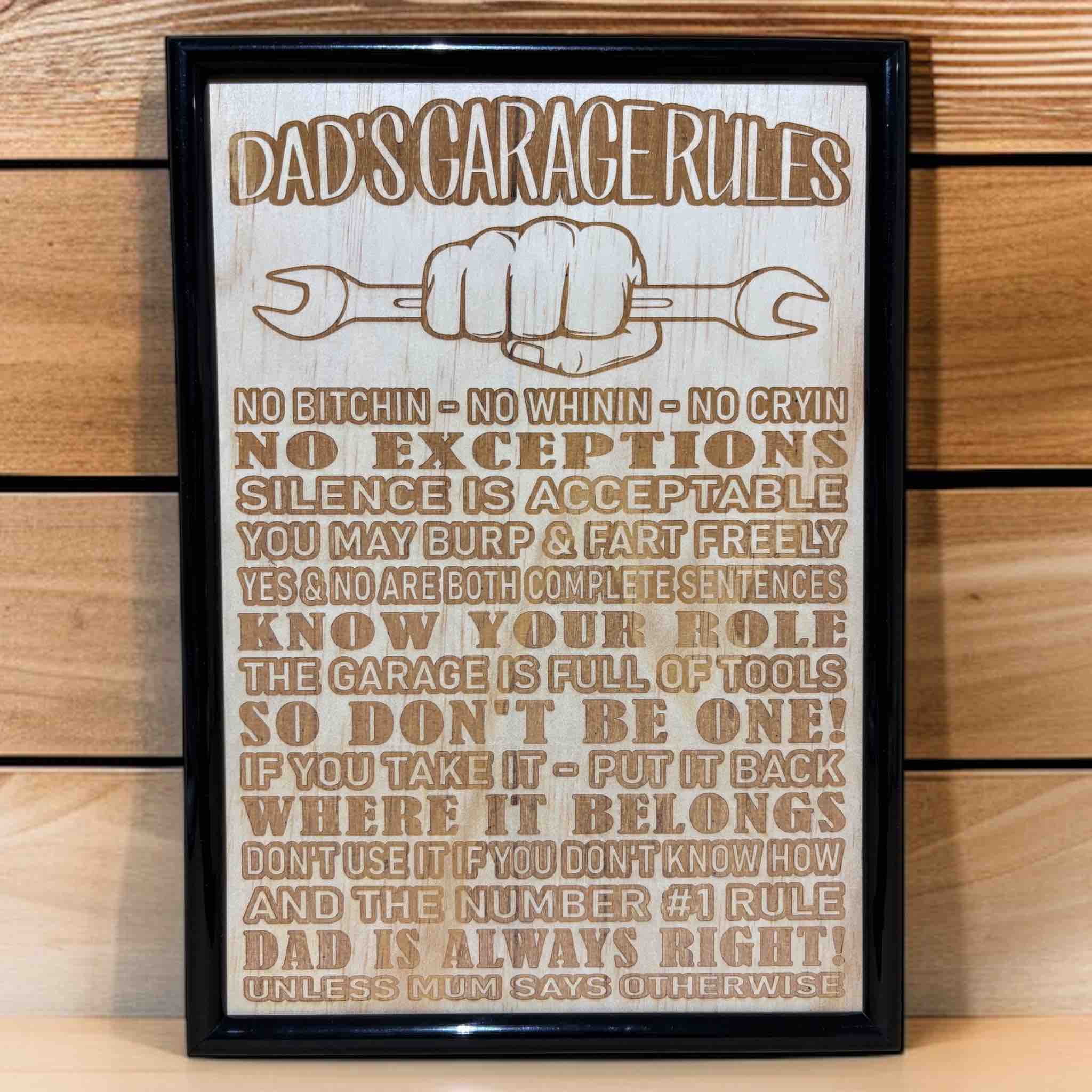 Dad’s Garage Rules wood engraved art design in black frame, funny workshop sign with spanner graphic, Laser Design Creations, Australia.