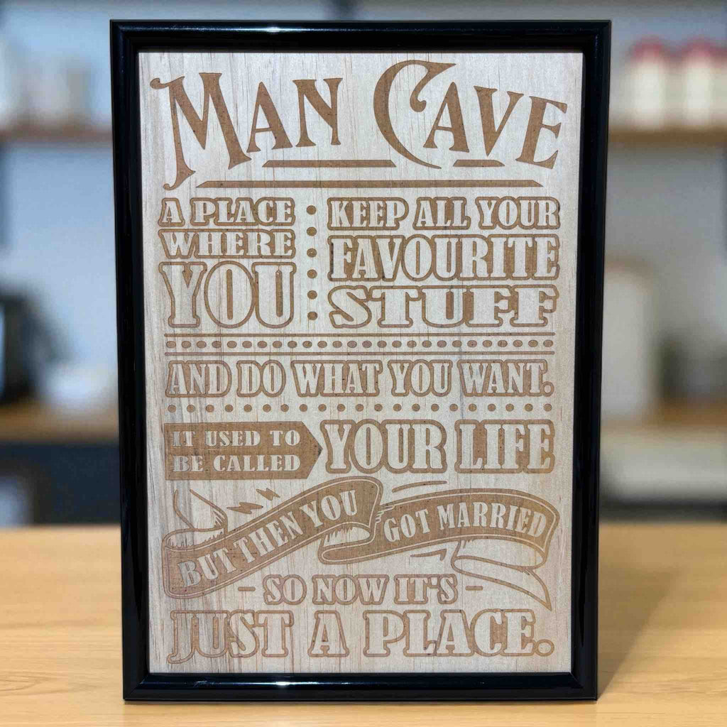 Man Cave wood engraved art sign displayed on bar counter, funny, humorous home bar wall art, Laser Design Creations, Australia.