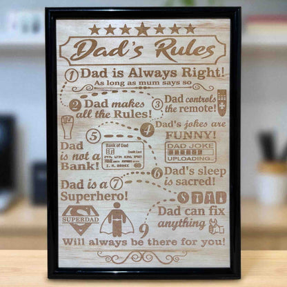 Dad’s Rules wood engraved sign displayed on timber table, humorous dad wall decor, Laser Design Creations, Australia.