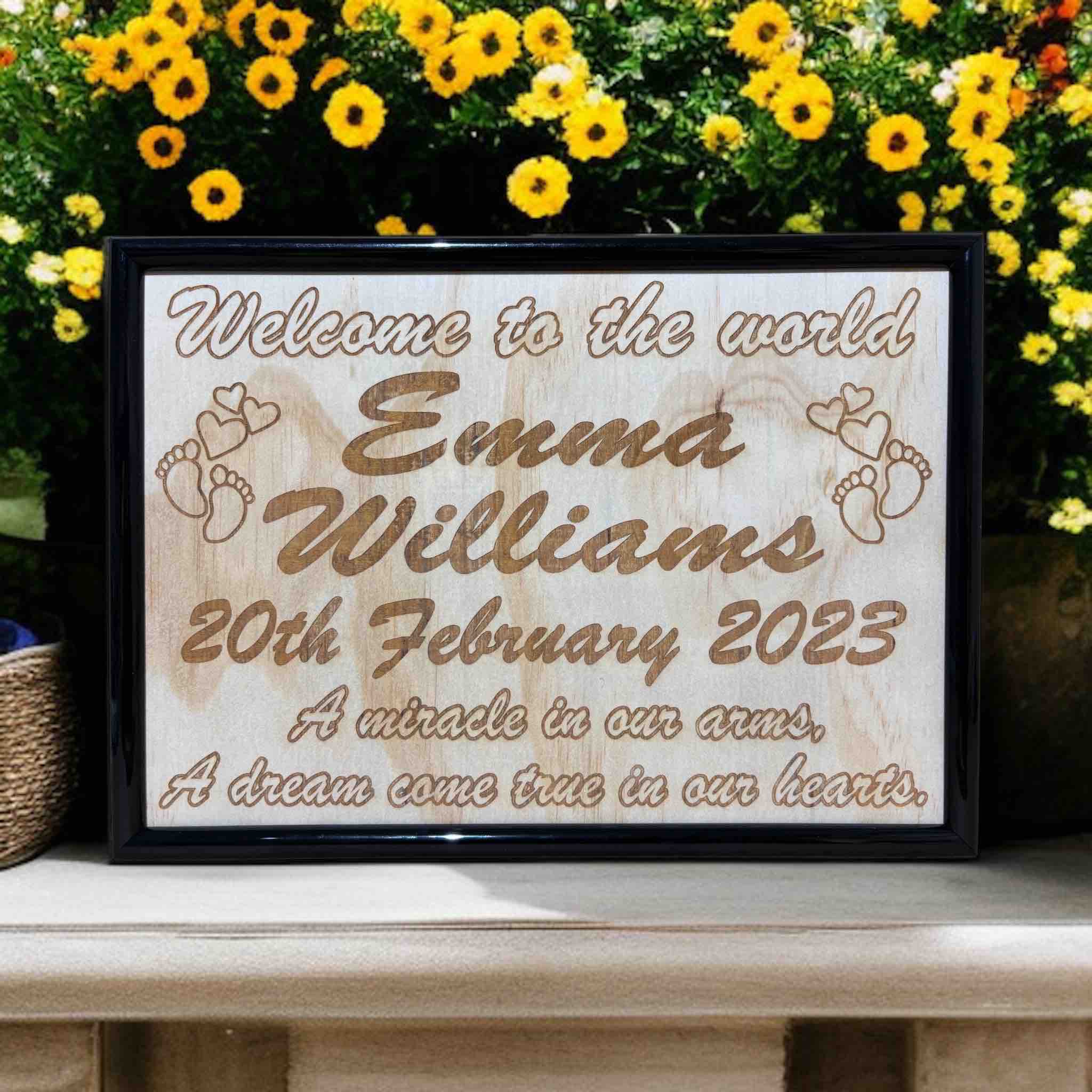 Wooden framed personalised baby announcement design, featuring engraved text with examples of personalized names and birth dates. Australian made. Laser Design Creations