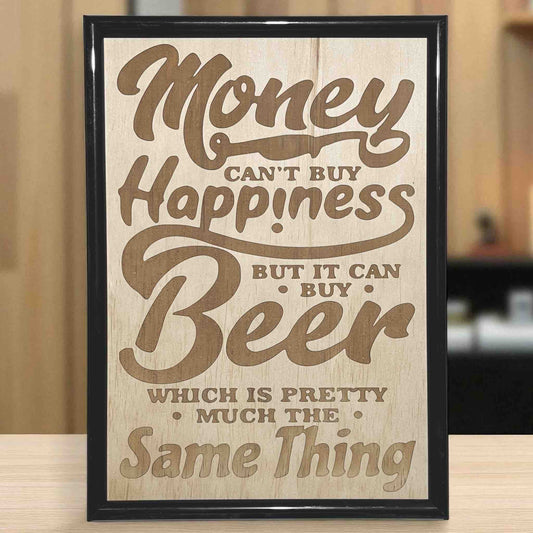 A wood sign with an engraved text that reads 'Money can't buy happiness but it can buy beer'. Australian Made. Laser Design Creations.