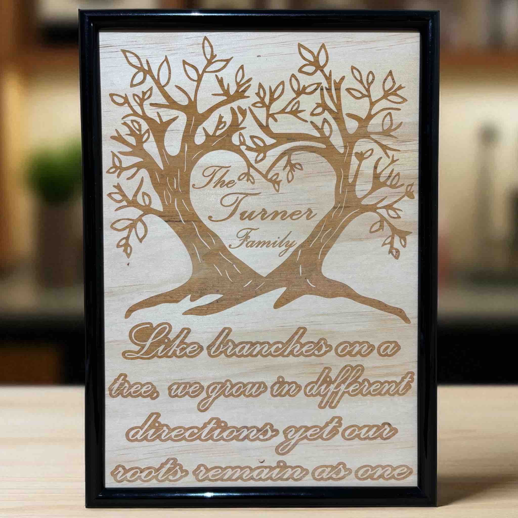 Wood engraved design featuring a family tree of life with personalised name engraved, Made in Australia. Laser Design Creations.