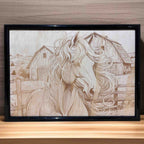 Framed horse and barn wood engraving on radiata pine plywood – rustic Aussie decor by Laser Design Creations.