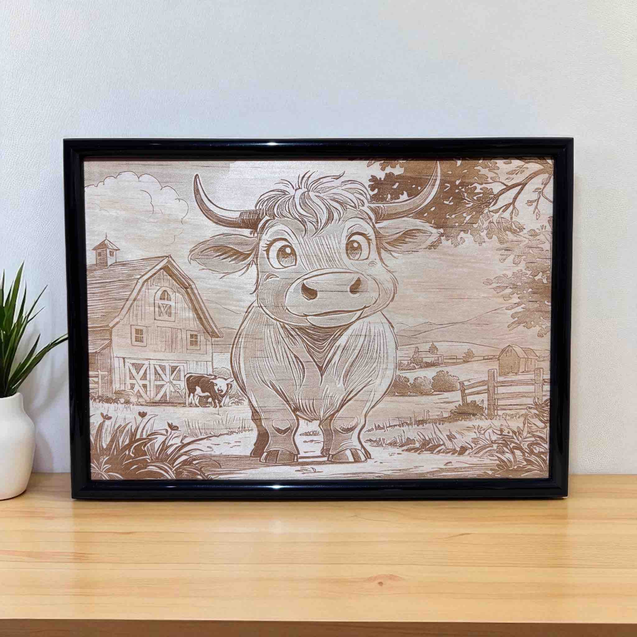 Wood engraved art of a cartoon cow at a barnyard, framed by Laser Design Creations.