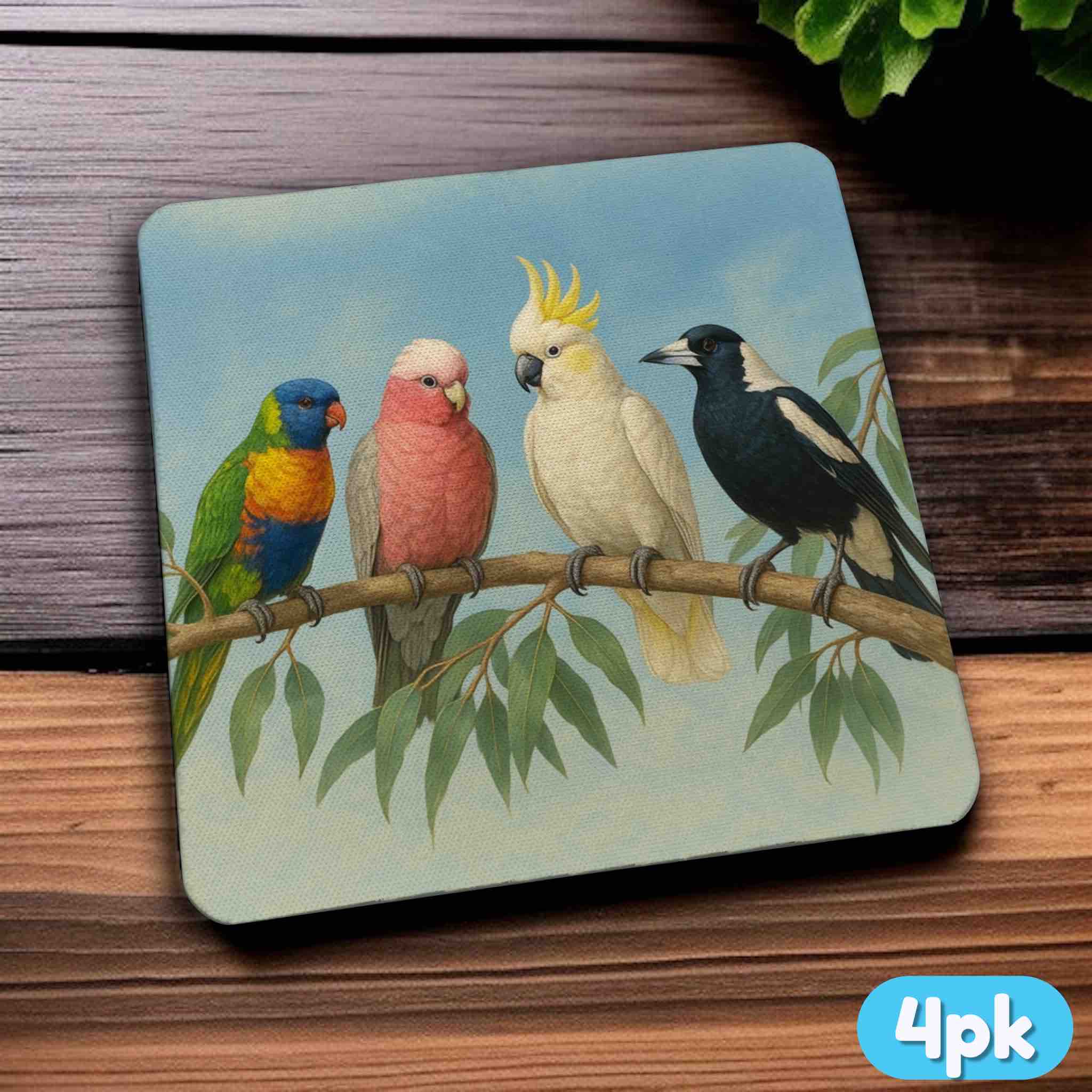Side view of a set of four Aussie birds neoprene coasters with colourful birds and foliage, by Laser Design Creations.