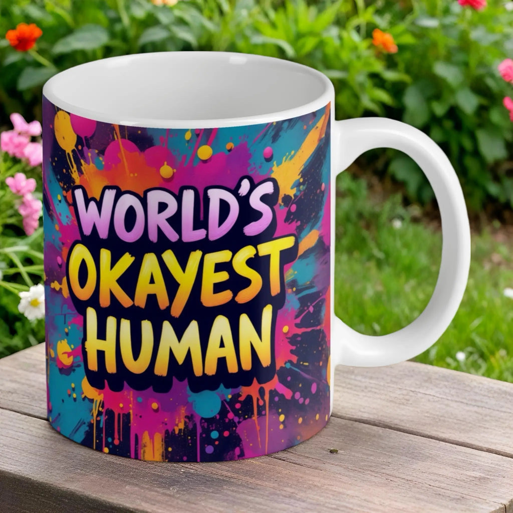 Reverse side of the 'World's Okayest Human' mug, showing the vibrant and sarcastic quote design, by Laser Design Creations.