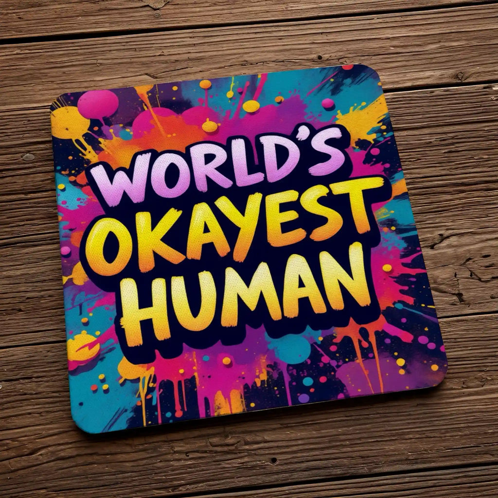 Side view of a set of four sarcastic humour coasters with a bright paint splash design by Laser Design Creations.