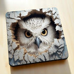 Side view of Peeking Snowy Owl Cracked Wall neoprene coasters, showcasing a clever 3D illusion illustration of a fluffy white owl peeking through a cracked stone wall by Laser Design Creations.