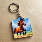 Side view of the Animated Brown Horse keyring, showcasing a happy galloping cartoon horse in a meadow by Laser Design Creations.