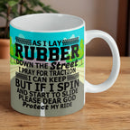 Reverse side of Protect My Ride Traction Prayer ceramic mug, showcasing the funny, bold graphic text "As I Lay Rubber Down The Street... Protect My Ride" by Laser Design Creations.