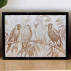 Detailed close-up of the Australian birds wood engraving in a home setting, handmade by Laser Design Creations.