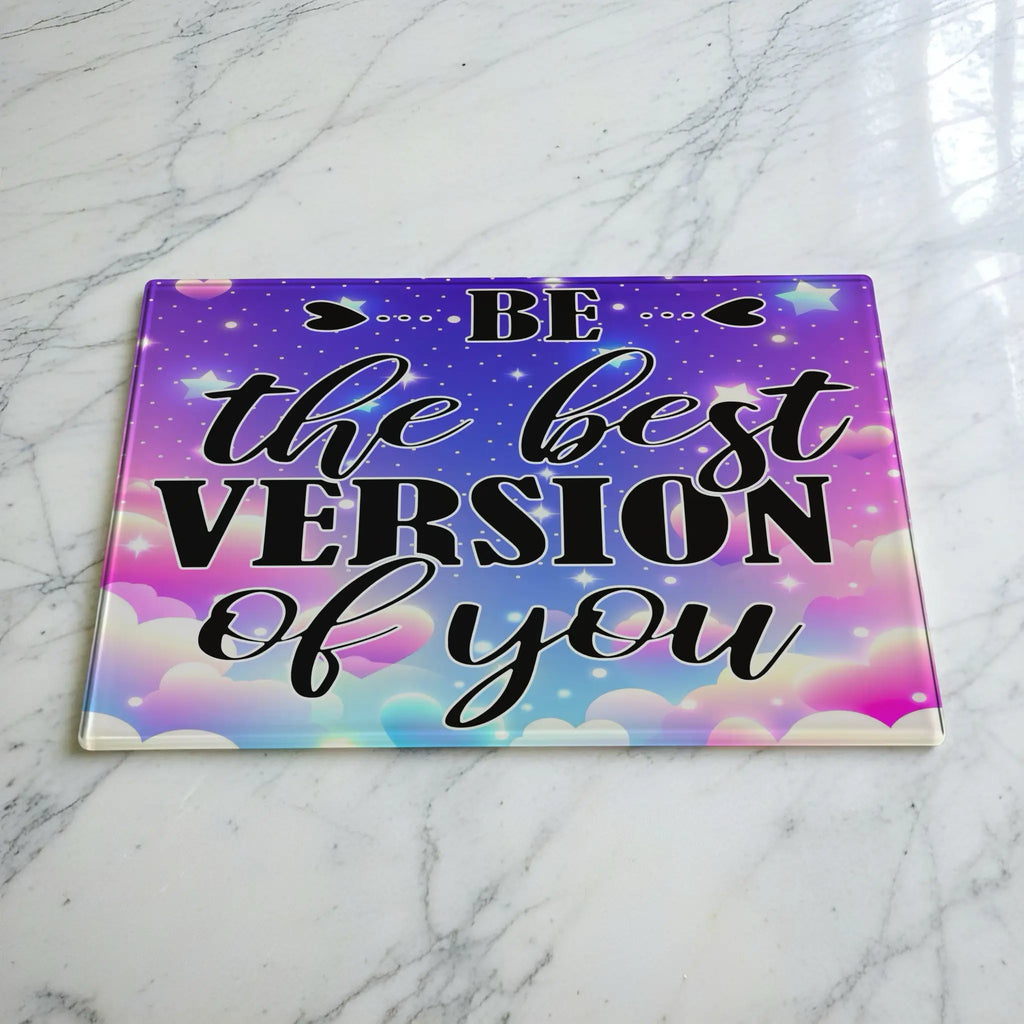 Be The Best Version Of You Pastel Dream glass chopping board by Laser Design Creations, featuring a vibrant, motivational pastel cloud background.