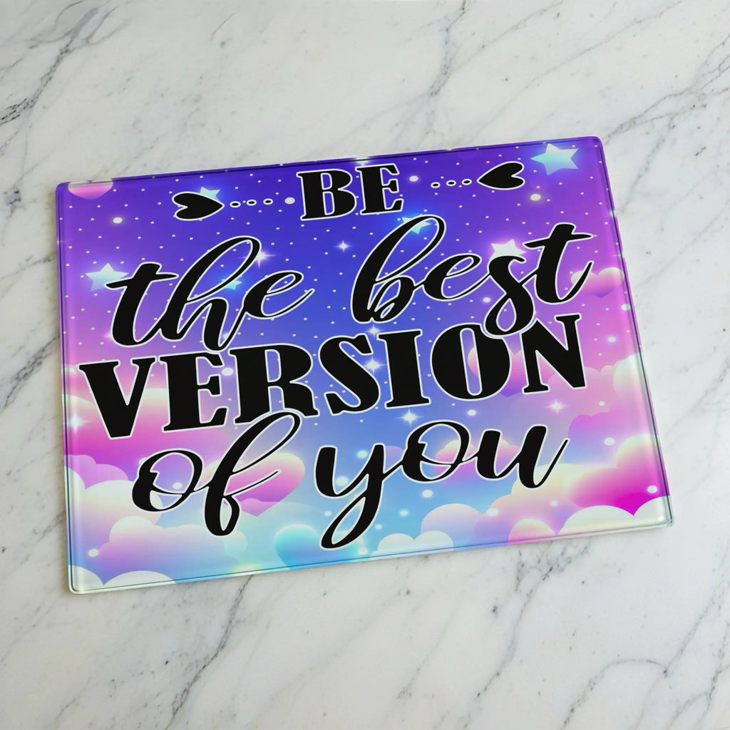 Pastel cloud motivational quote glass chopping board from Laser Design Creations featuring the inspirational quote BE the best VERSION of you set against a vibrant pastel cloudscape.