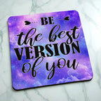 Side view of Be The Best Version Of You Purple Galaxy Art neoprene coaster with the edge detail of the cosmic purple stardust pattern, by Laser Design Creations.