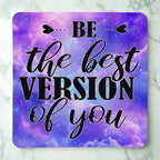 Top view of Be The Best Version Of You Purple Galaxy Art neoprene coaster with the motivational quote "BE... the best VERSION of you" amidst a deep purple and blue space background, by Laser Design Creations.