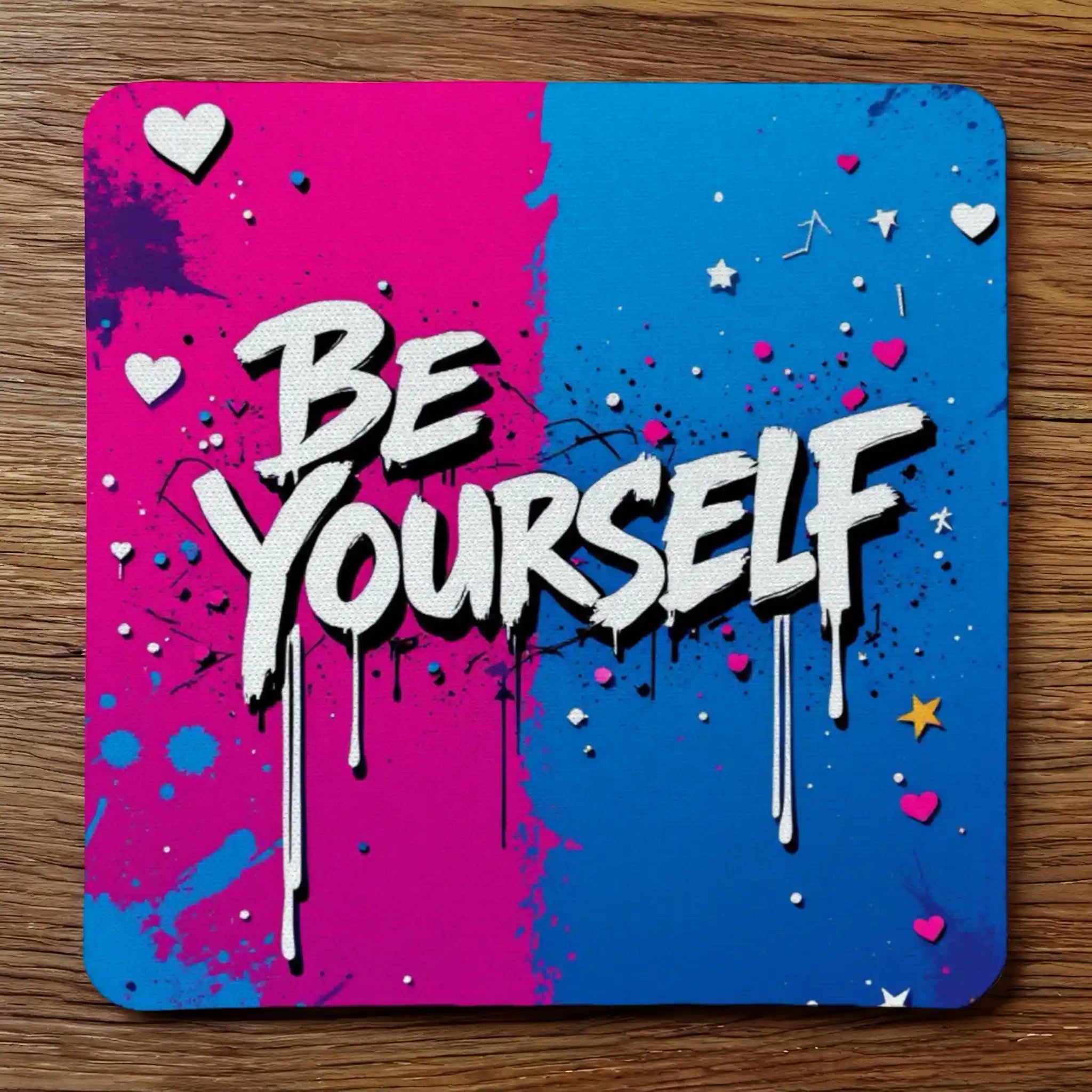 Be Yourself Graffiti Pink Blue neoprene coasters by Laser Design Creations, featuring vibrant pink and blue street art graffiti style with paint splatters and BE YOURSELF text.