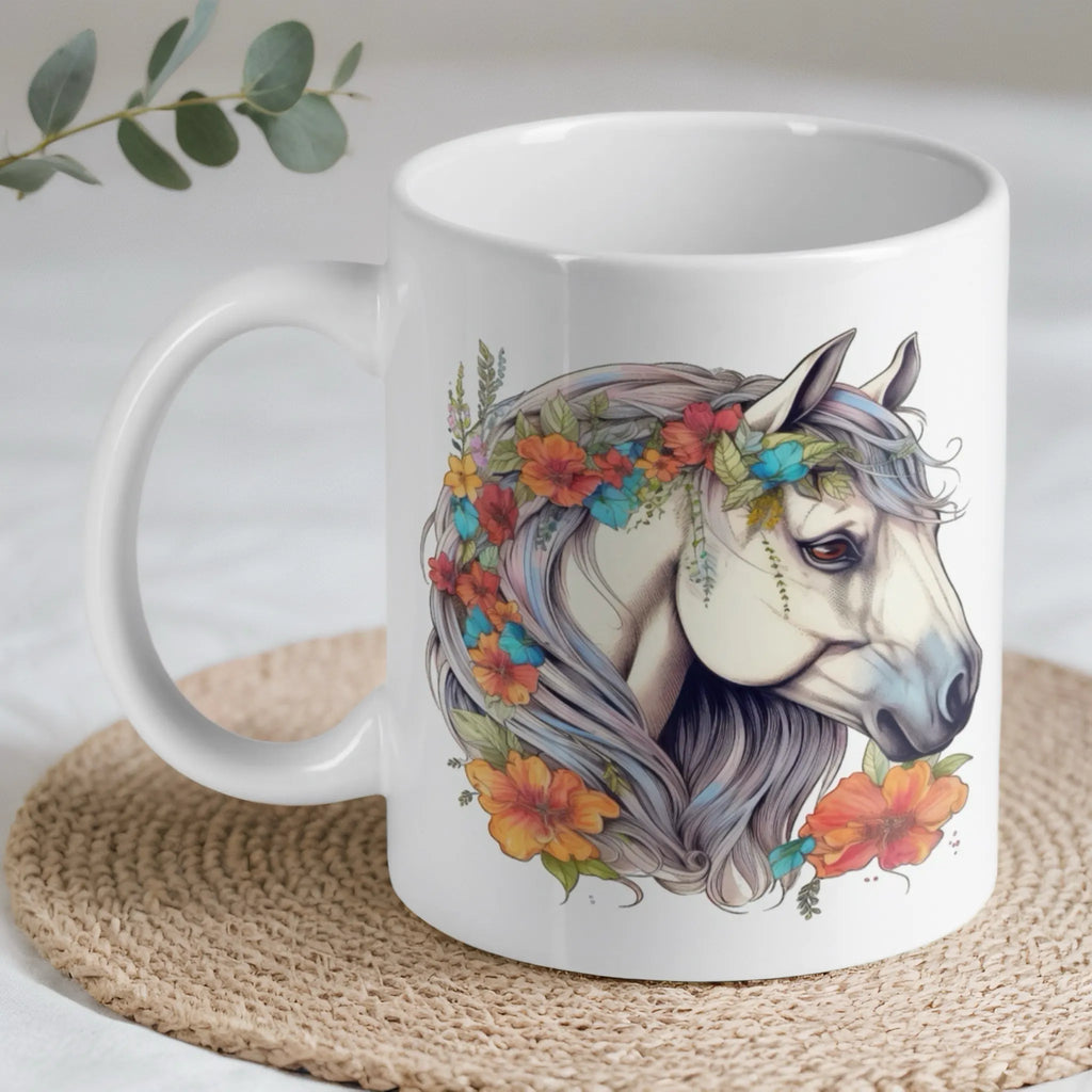 Graceful grey horse with orange and red flowers in its mane ceramic mug by Laser Design Creations.