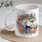 Graceful grey horse with orange and red flowers in its mane ceramic mug by Laser Design Creations.