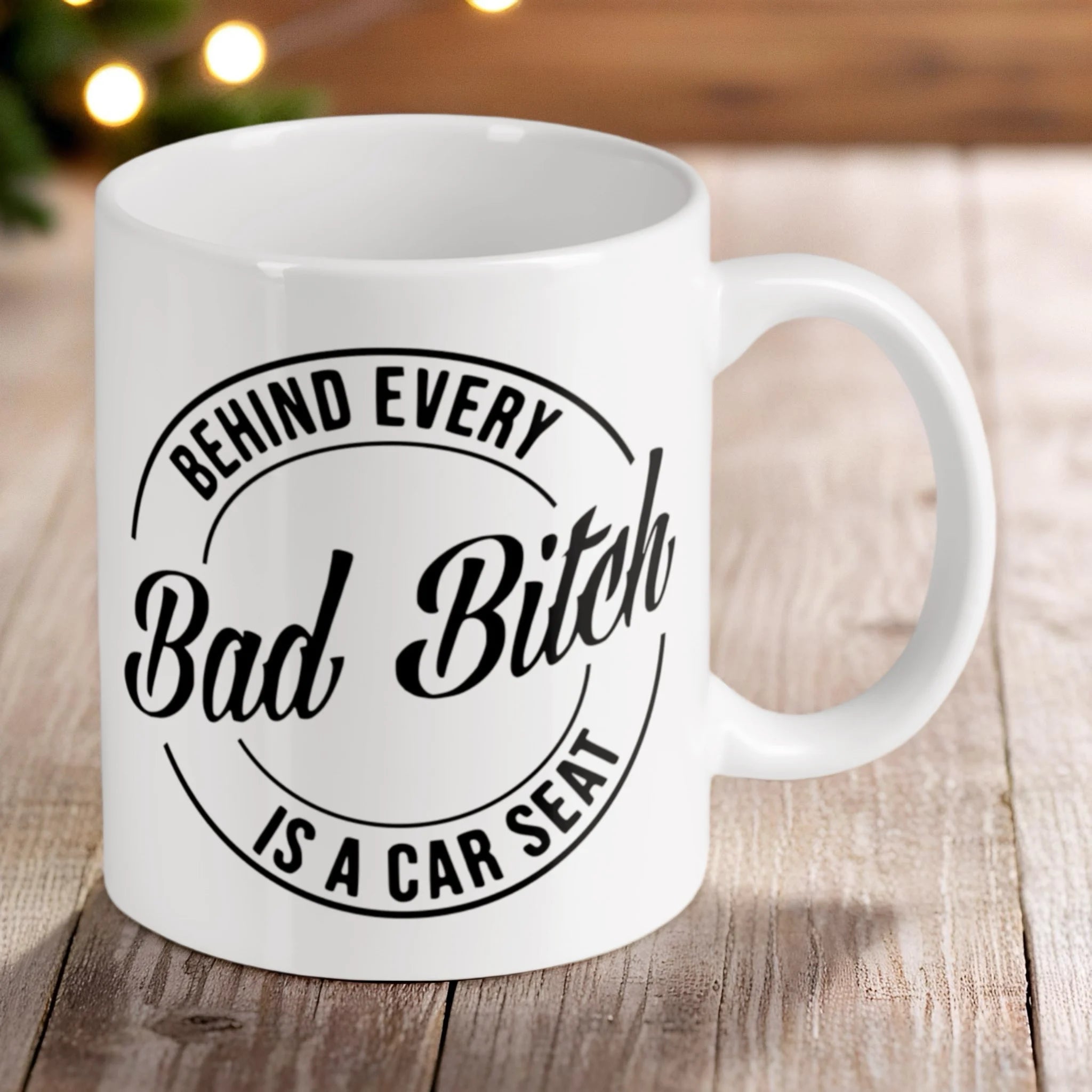 Reverse side of the 'Bad Bitch Car Seat' ceramic mug, showcasing the wrap-around artwork by Laser Design Creations.