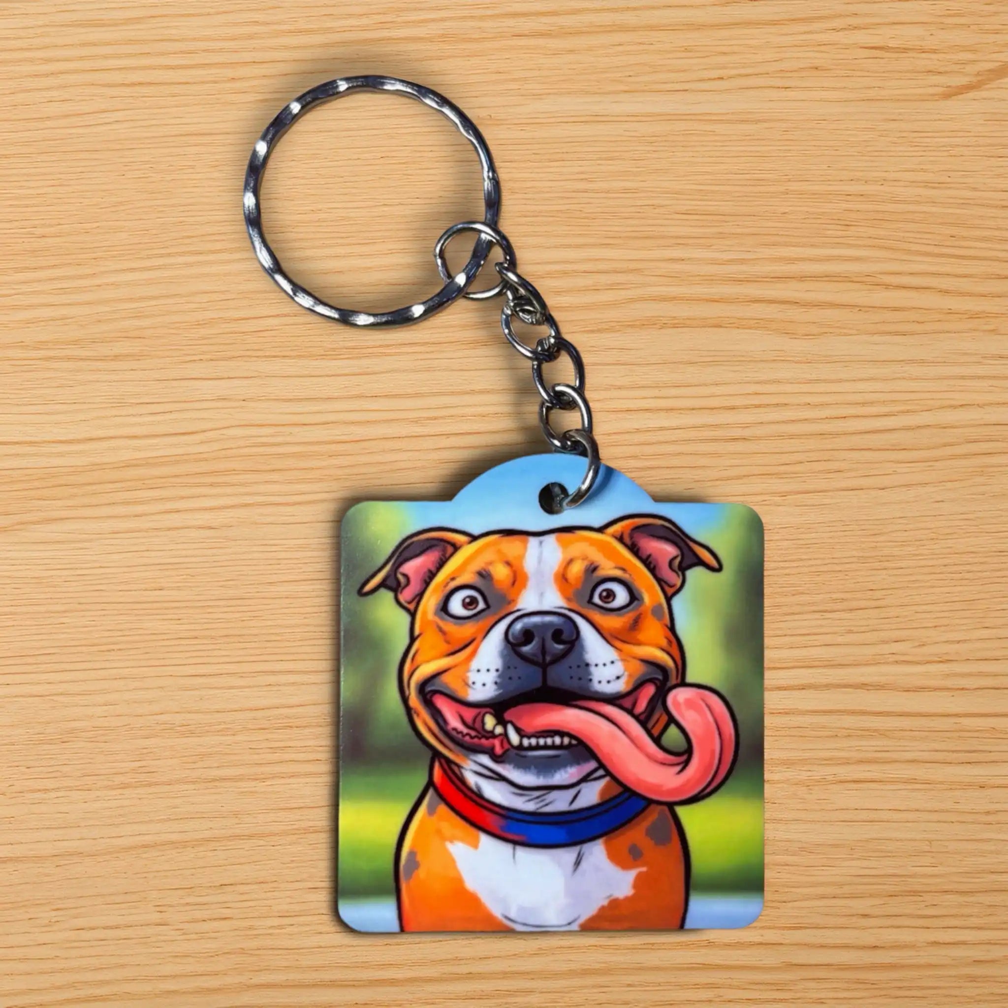 Goofy Staffy Dog Long Tongue acrylic keyring by Laser Design Creations, featuring a comical, cartoony dog portrait perfect for humour lovers.