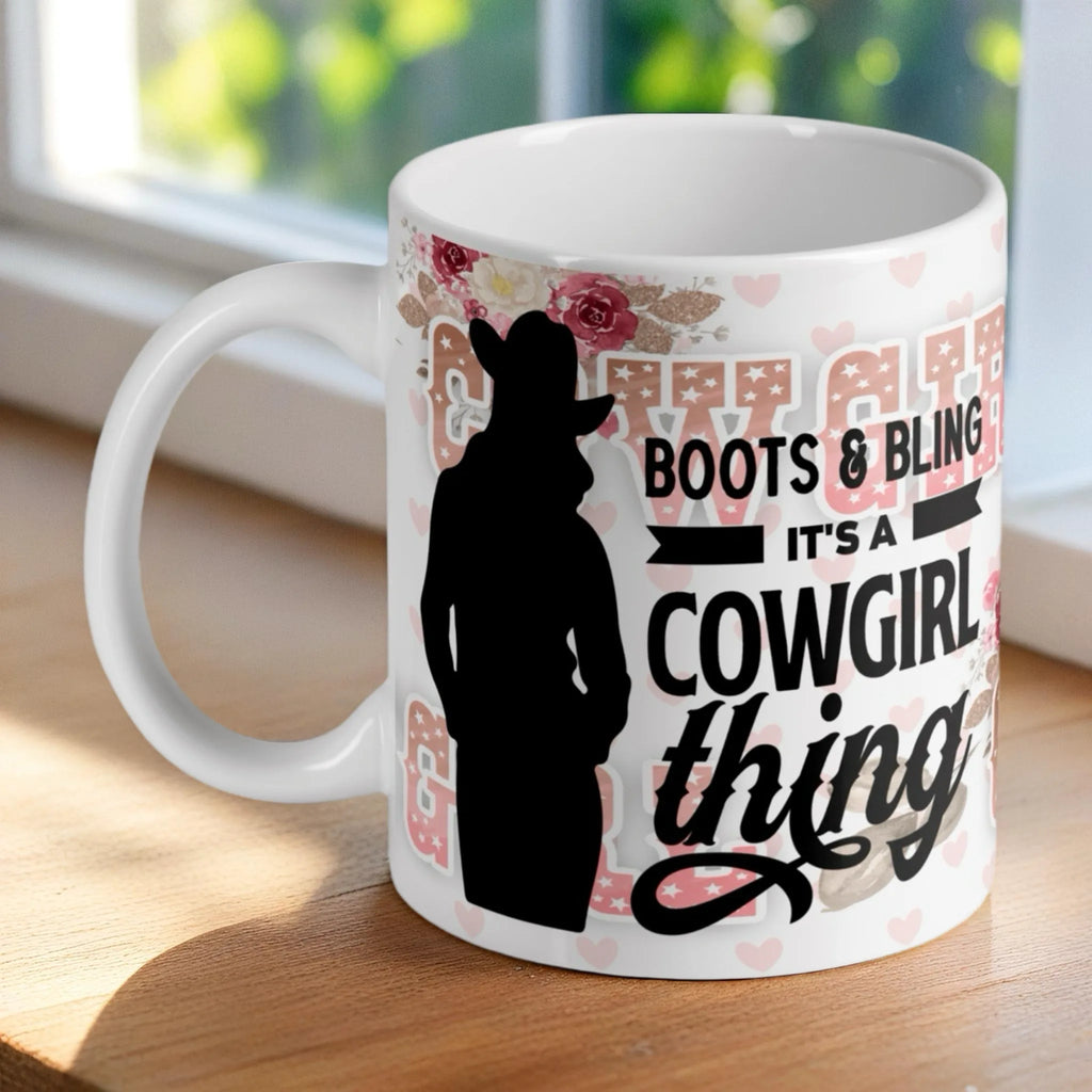 'Boots & Bling It's a Cowgirl Thing' ceramic mug by Laser Design Creations, featuring a stylish quote.
