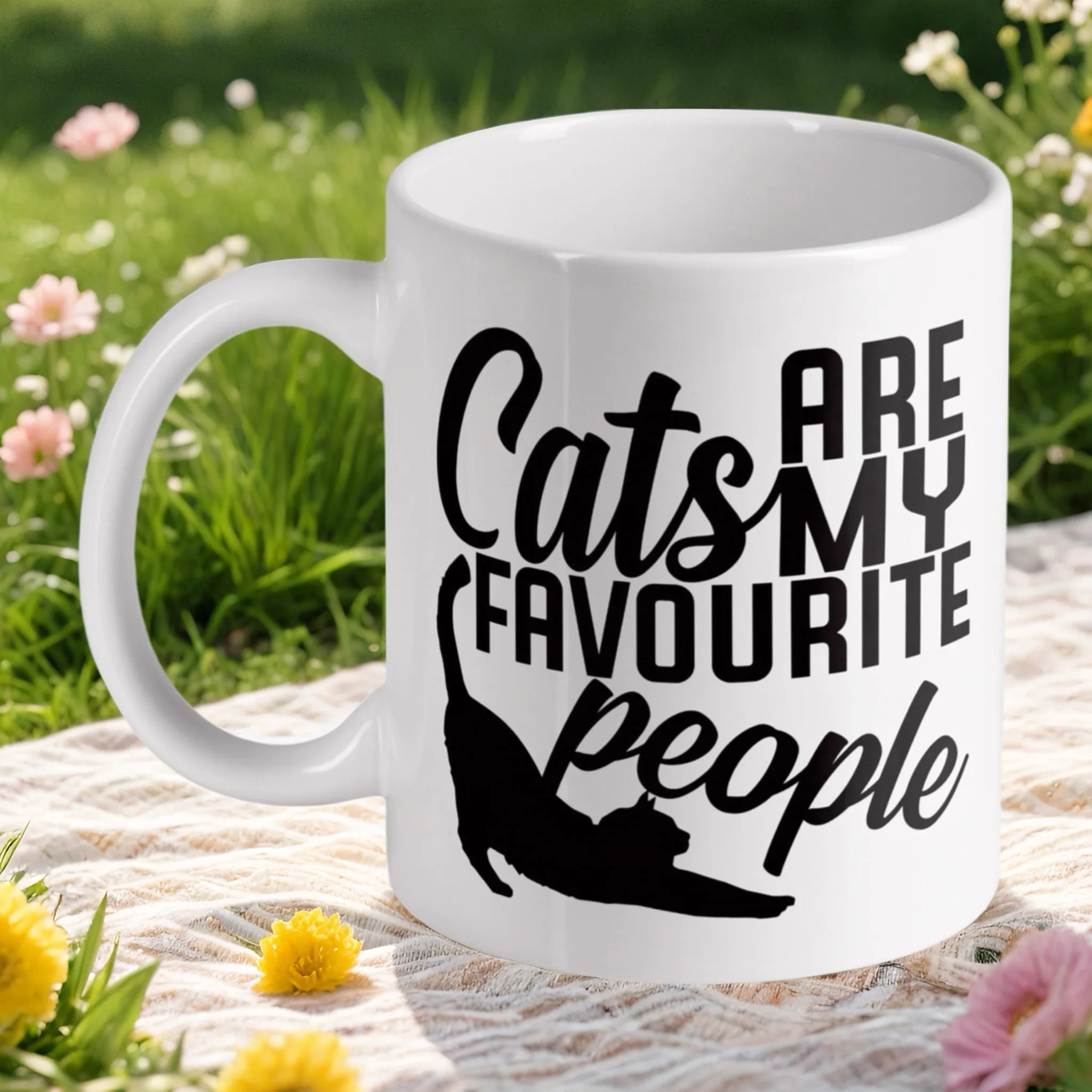'Cats Are My Favourite People' ceramic mug by Laser Design Creations, featuring bold text and a black cat silhouette.