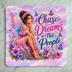 Top view of Chase Dreams Not People Fairy neoprene coaster with a whimsical pastel fairy illustration, by Laser Design Creations.