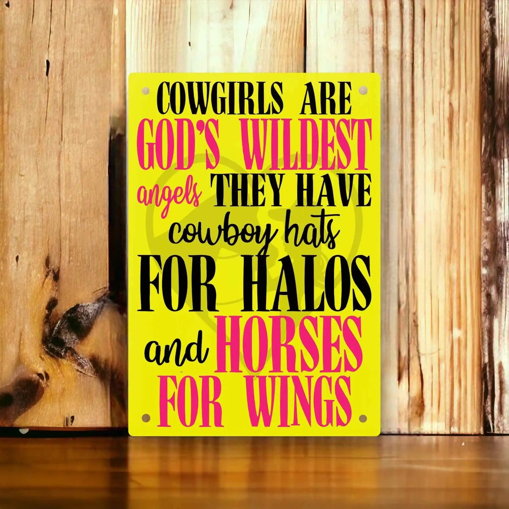 Country Decor Aluminium Sign by Laser Design Creations, featuring the quote "Cowgirls are God's wildest angels they have cowboy hats for halos and horses for wings." in a bold, typographic style.