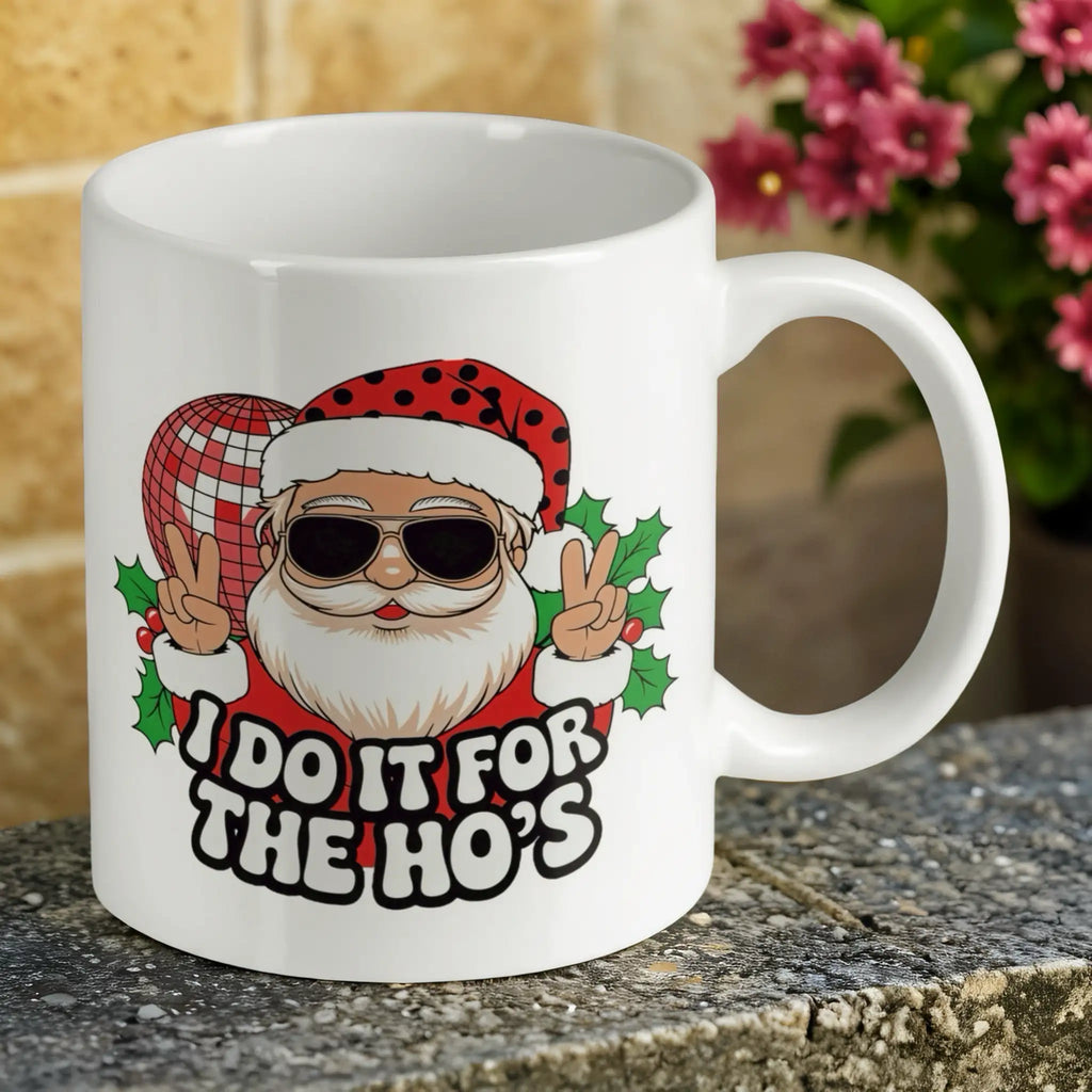 Reverse side of Funny Santa Disco Ball Ho's Quote ceramic mug, showcasing the retro Christmas party design with rude text and a graphic of Santa by Laser Design Creations.