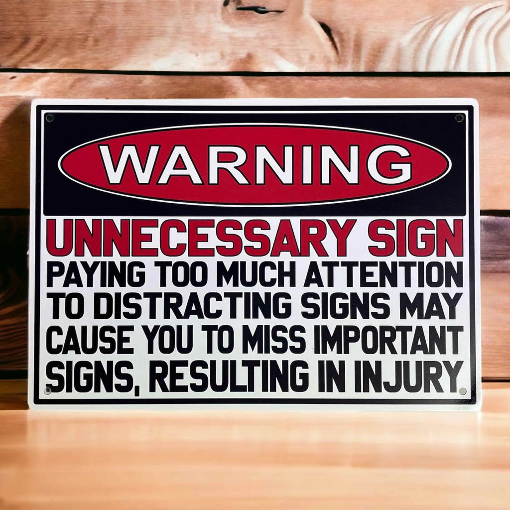 Funny Warning Unnecessary Distracting Sign Aluminium Sign by Laser Design Creations, featuring bold red and black text on a white background, perfect for office parody.