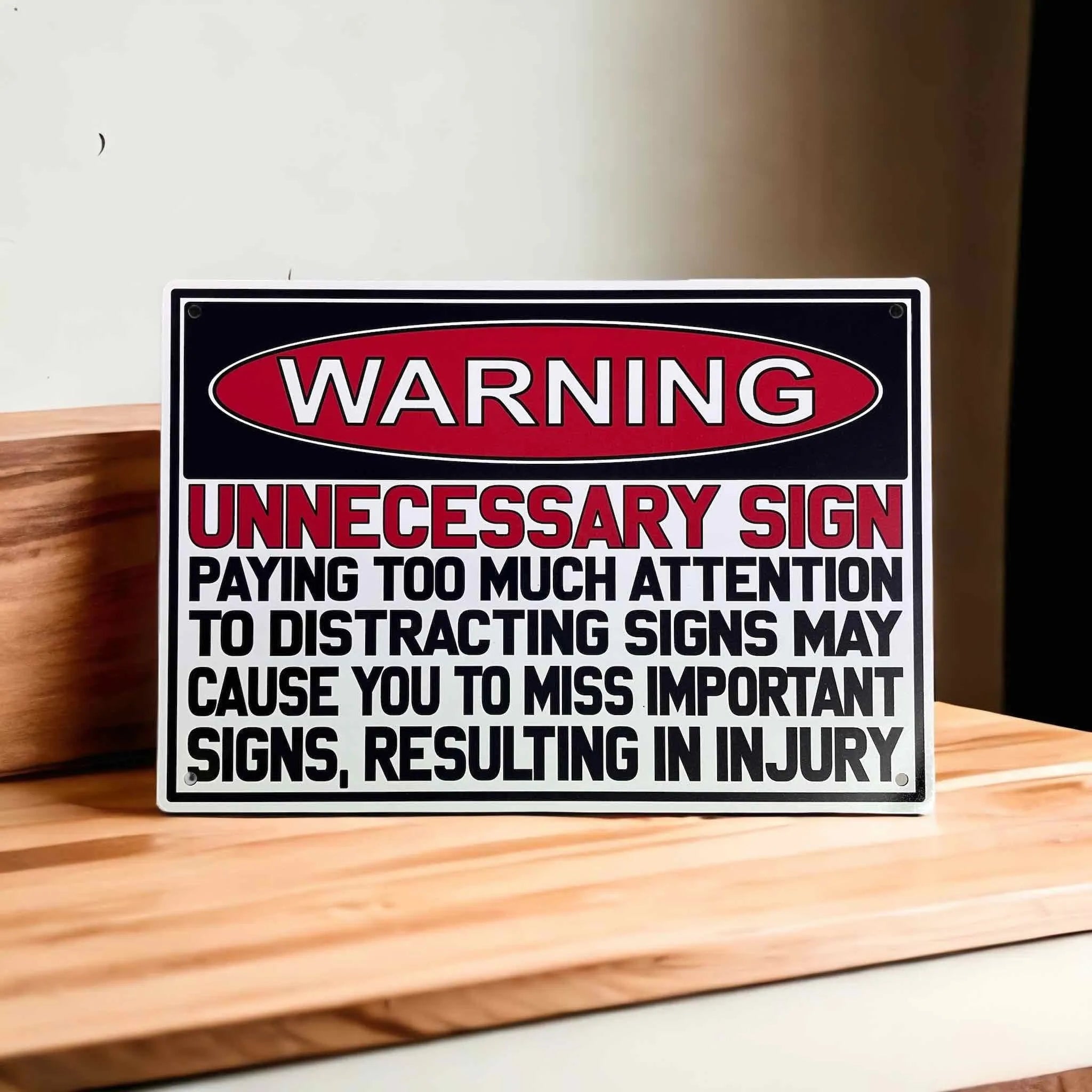 Workplace Humour Novelty Sign Aluminium Sign by Laser Design Creations, featuring the 'WARNING UNNECESSARY SIGN...' quote, designed for pranksters and shed decor.