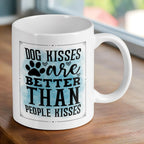 Reverse side of 'Dog Kisses are Better' quote ceramic mug, showcasing the humorous typography with a paw print accent and watercolour background by Laser Design Creations.
