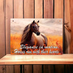 Elegance in Motion Quote Aluminium Sign by Laser Design Creations, featuring the quote "Elegance in motion. Horses run with their hearts" on an artistic, warm background.