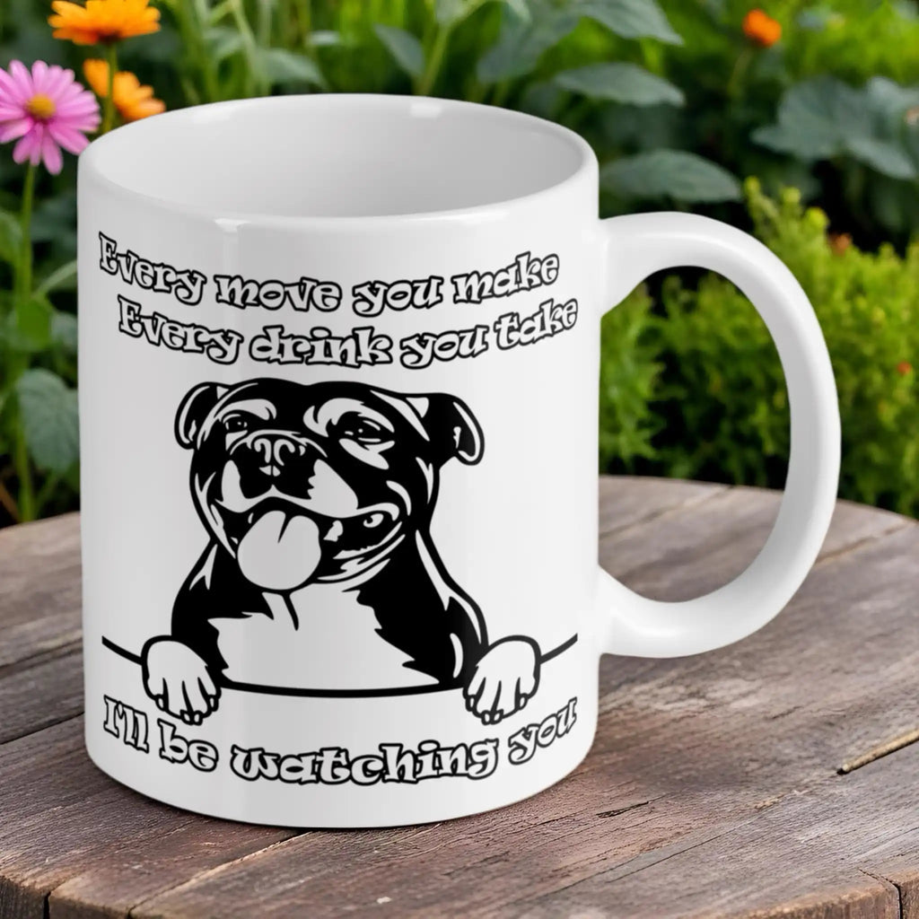 Reverse side of Cheeky Staffy "I'll Be Watching You" mug, showing a Staffy face and text about watching you, by Laser Design Creations.