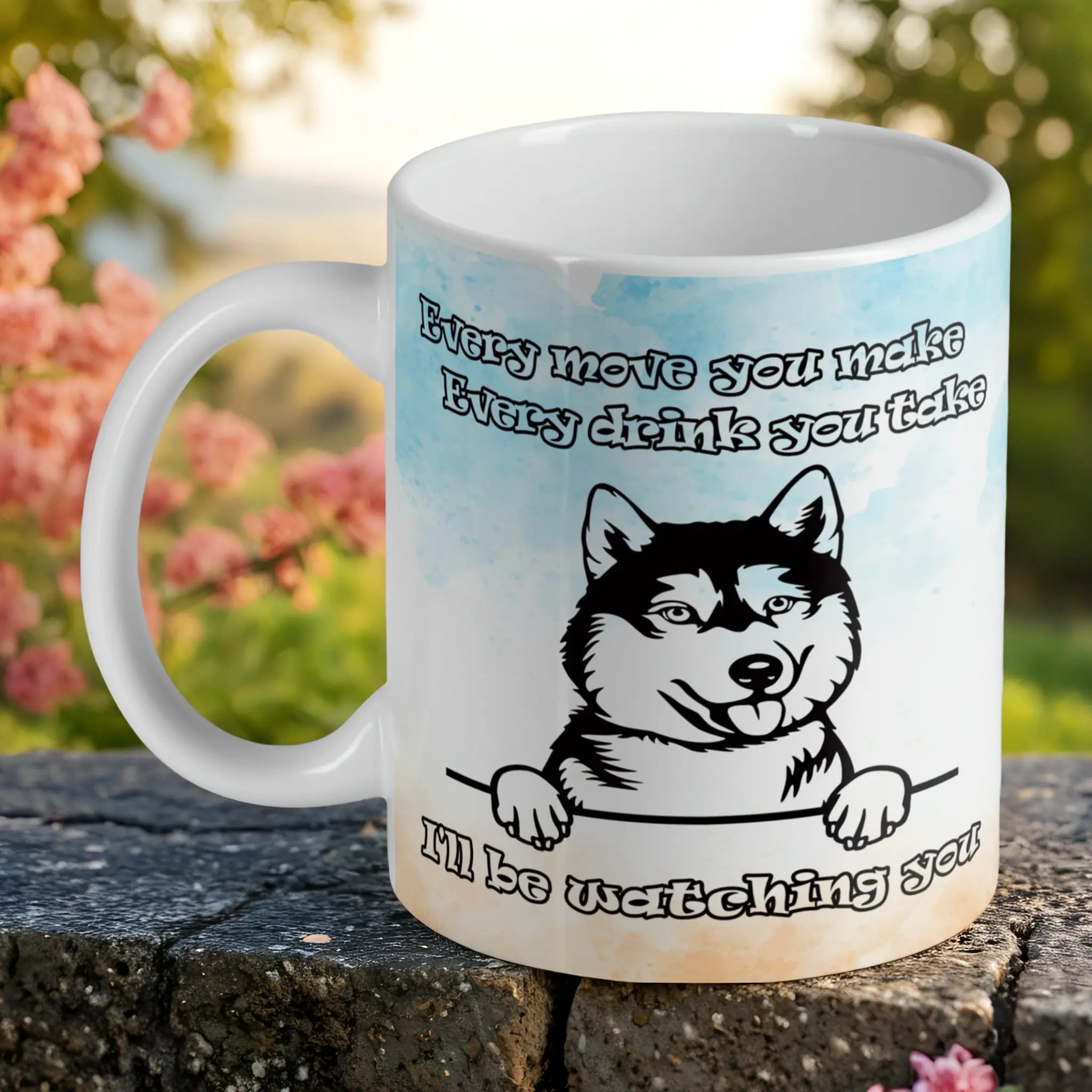 Peeking Husky 'I'll be watching you' ceramic mug by Laser Design Creations, featuring a funny peeking Husky dog with the quote 'Every move you make... I'll be watching you' on a watercolour background.